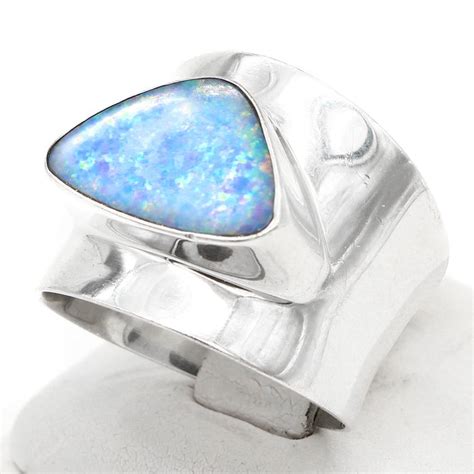 Celestial Elegance: A Comprehensive Guide to Opal Ring Silver