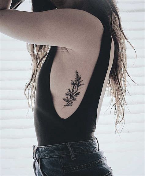 Celestial Symphony: Unveiling the World of Ribcage Tattoos for Women