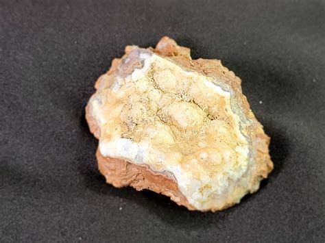 Chalcedony Geode: A Symphony of Serene Beauty and Practical Abundance