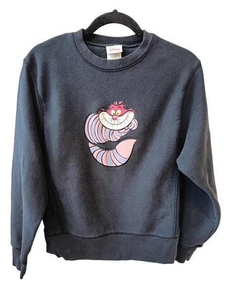 Cheshire Cat Sweatshirts: A Mysterious and Magical Fashion Statement