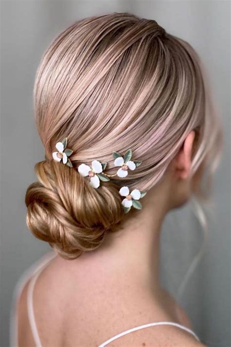 Chignon with Loose Tendrils: