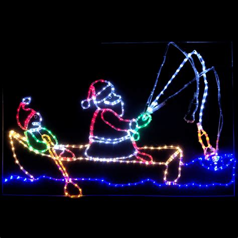 Christmas Boat Decorations featuring a wire frame tree and linear LED lights on a modern yacht