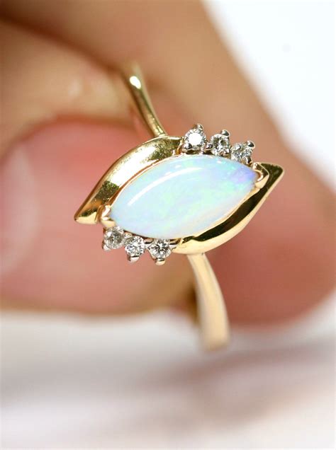 Classic Opal Solitaire Rings: