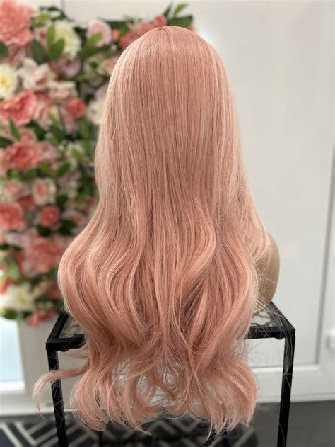 Coral Wig: Embrace the Ocean's Hue for a Vibrant Transformation