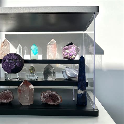 Crystals in Cages: An Exploration of the Benefits and Evolution of Crystal Display Cases