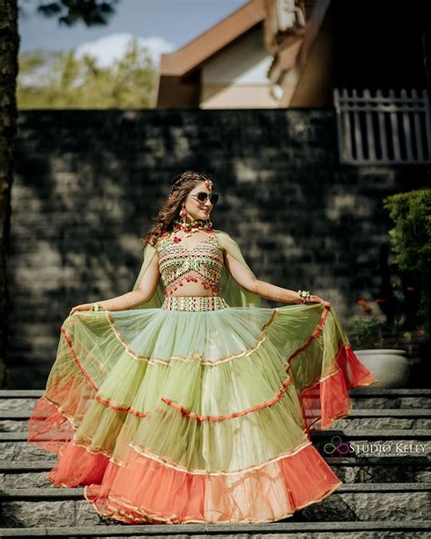 Dazzle at Your Mehndi Ceremony with Exquisite Outfits for Brides Online