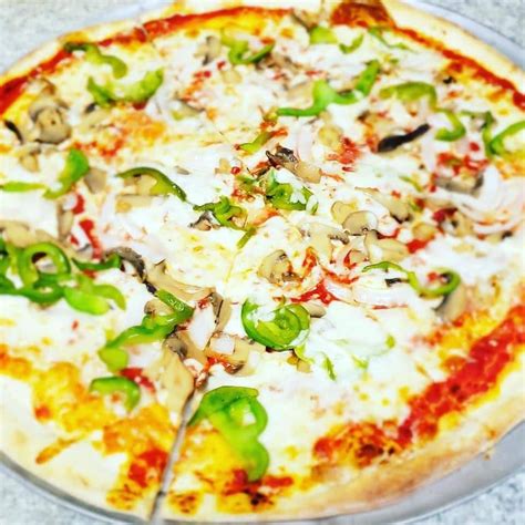 Delight in the Authentic Flavors of Port Jervis Brick Oven Pizza