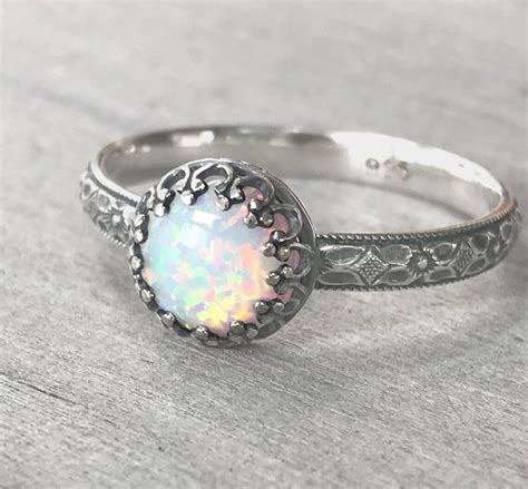 Delving into the Mystique and Allure of Sterling Silver Opal Rings