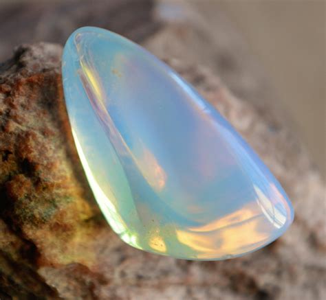 Discover the Enchanting World of Opalite: A Stone of Serenity and Transformation