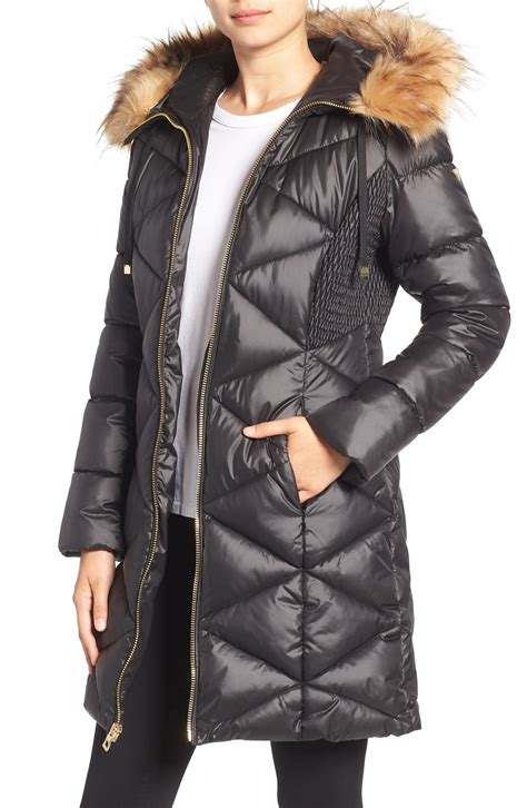 Discover the Ultimate Guide to Guess Puffer Coats for Women: Stay Warm and Stylish