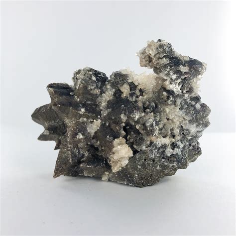 Dogtooth Calcite: A Sparkling Gem from the Earth's Depths