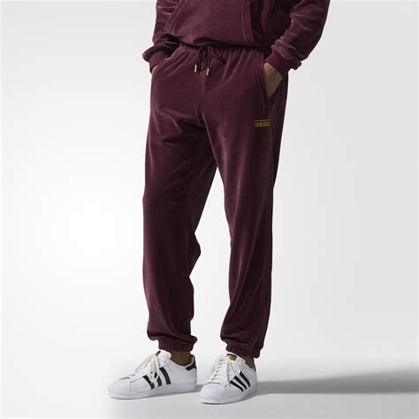 Elevate Your Comfort and Style with the Luxurious Velour Sweatsuit from adidas