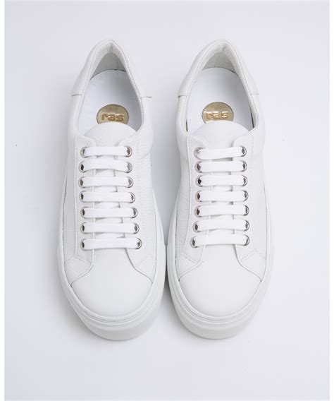 Elevate Your Style with the Power of White Leather Platform Sneakers