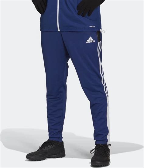 Elevate Your Training with Adidas Primeblue Tiro Warm Training Pants: A Symphony of Style, Sustainability, and Performance