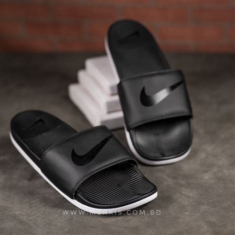 Elevate your casual style and indulge in exceptional comfort with a pair of Nike yellow and black slides. Visit Nike's website or your preferred retailer today to explore the latest collection and find the perfect slides to complement your wardrobe. Embrace the vibrant appeal, unparalleled comfort, and effortless versatility of these iconic slides.