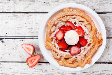 Embark on a Delectable Journey to Funnel Cake Heaven: A Comprehensive Guide