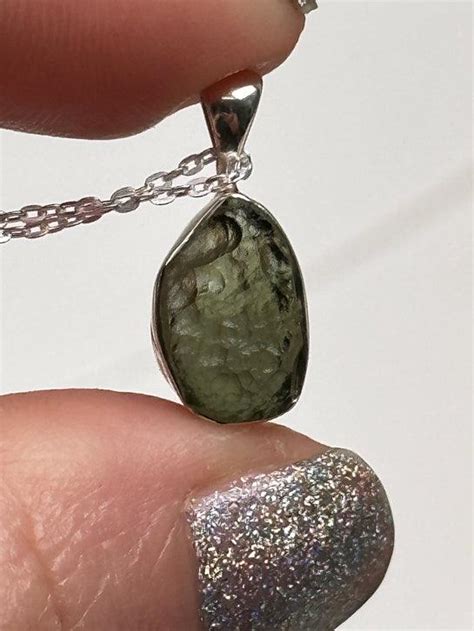 Embark on a Journey of Enchantment with Moldavite Necklaces