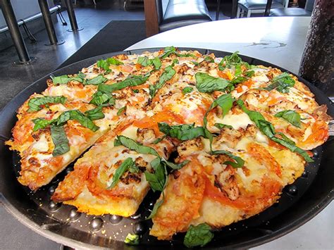 Embark on a Pizza Pilgrimage in West Omaha, NE: 10 Must-Try Delicacies