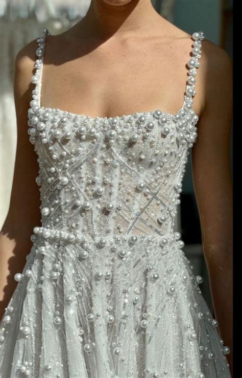 Embellished Wonders: White Dresses with a Touch of Sparkle