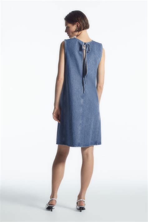 Embody Modern Chic with the Denim Shift Dress: A Timeless Staple for Every Woman