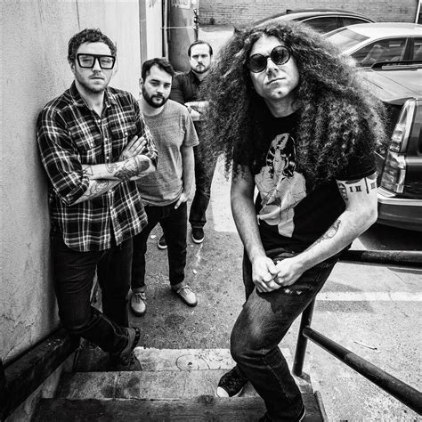 Embrace the Celestial Symphony with Coheed and Cambria's Enigmatic Attire