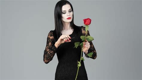 Embrace the Enigmatic Charm of Morticia Addams: A Guide to Living with Grace and Darkness