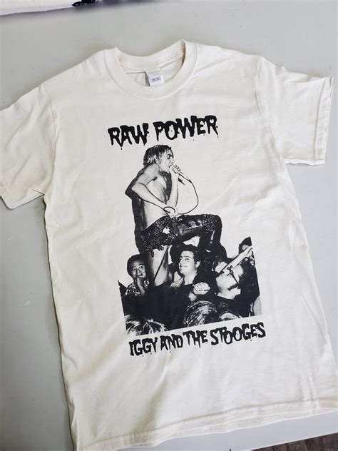 Embrace the Raw Energy and Punk Spirit with an Iggy Pop Stooges T-Shirt