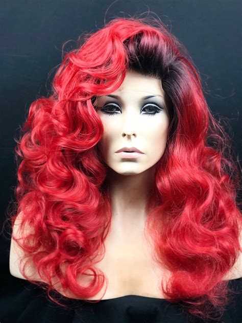 Embracing Fiery Elegance: The Allure of Red Lace Front Wigs