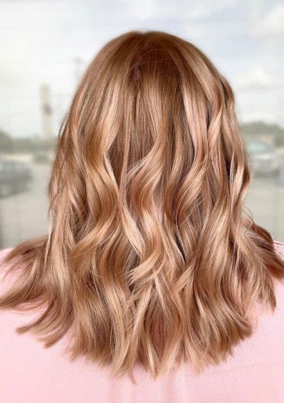 Enchanting Strawberry Blonde: A Timeless and Alluring Hair Color