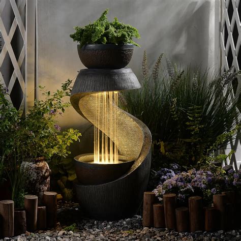 Enhance Your Outdoor Oasis with a Sphere Waterfall Fountain