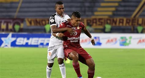 Envigado FC vs Deportes Tolima: Uma Batalha Épica no Estádio Polideportivo Sur (16/04/