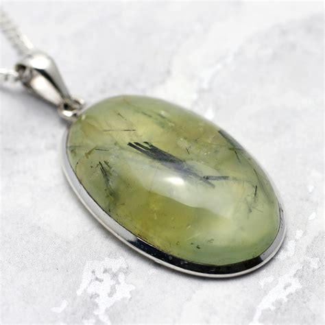 Epidote with Prehnite: A Vibrant Gemstone Duo for Jewelry and Metaphysical Healing