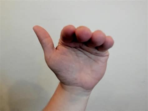 Extend your dominant hand: