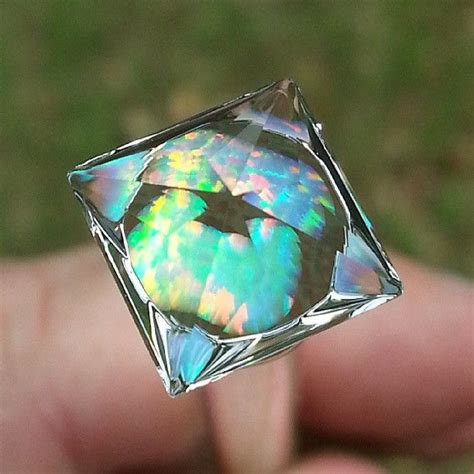 Faceted Opal: A Kaleidoscope of Iridescence, Fire, and Mystery