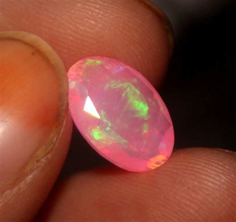 Facetted Opal: A Gemstone Symphony of Iridescence and Fire