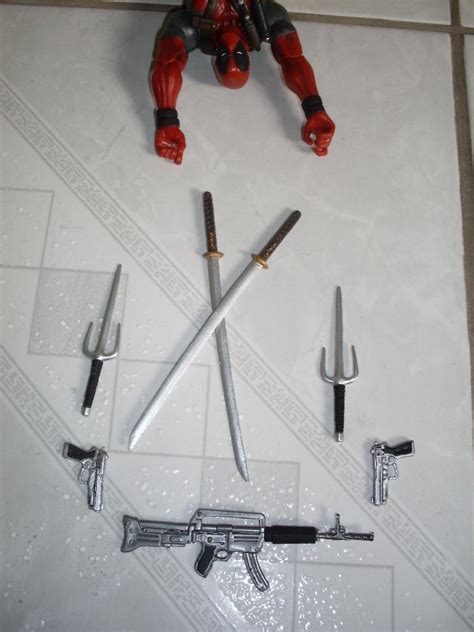 Firearms Delight: A Closer Look at Deadpool's Arsenal