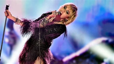 Fluttering Hearts: Unraveling the Kaleidoscope of Miley Cyrus's Journey