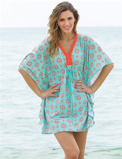 Get ready to turn heads this summer with our collection of 21 stylish beach dresses and coverups!