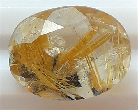 Golden Rutilated Quartz: A Gemstone of Growth, Success, and Spiritual Elevation