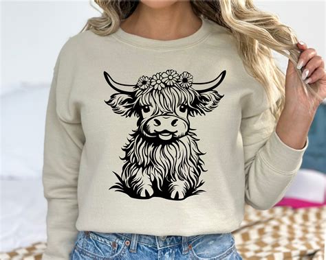 Highland Cow Sweatshirt: The Warm and Cozy Ally for Chilly Days