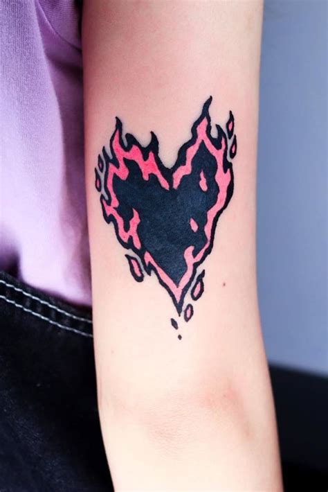 History and Symbolism of the Burning Heart Tattoo