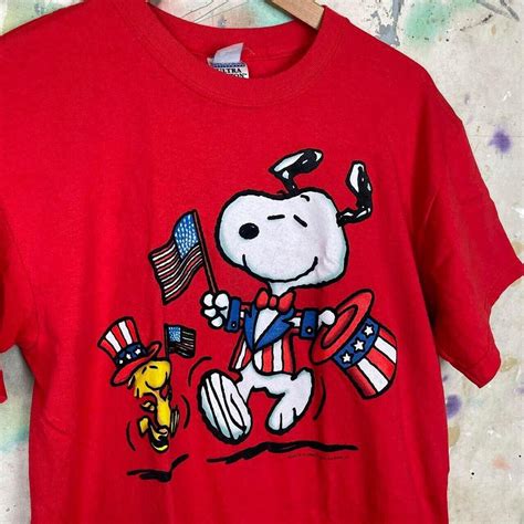 History of Snoopy 4th of July T-Shirts