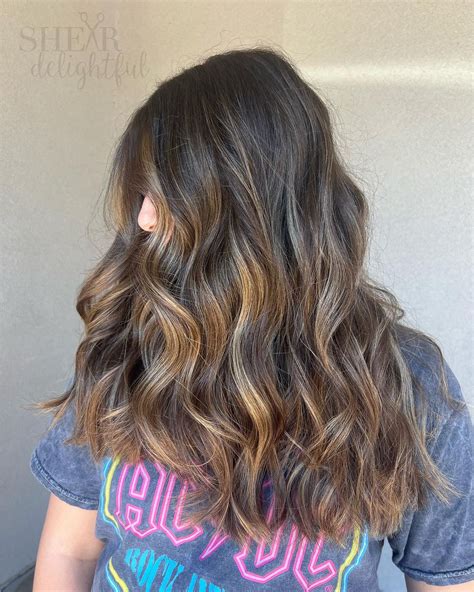 If you want a natural-looking, sun-kissed look with low maintenance, balayage is a great option.