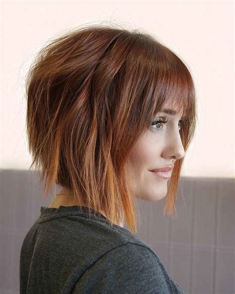 Ignite Your Confidence: Embrace the Fiery Red Bob with Bangs