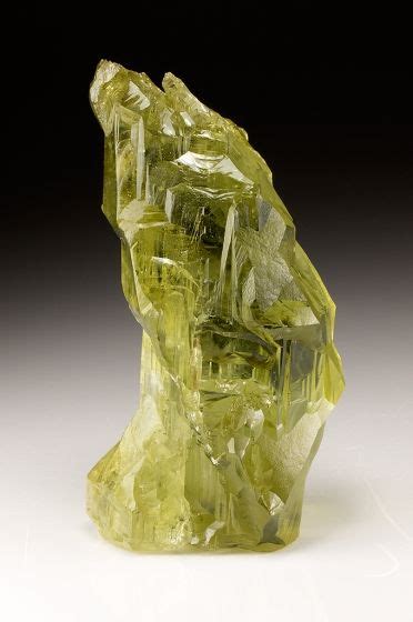 Introduction: The Enigmatic Allure of Yellowish Green Crystals