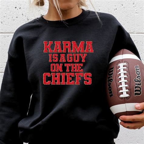 Karma Is the Guy on the Chiefs Sweatshirt