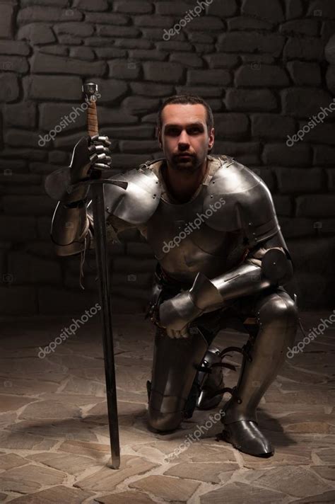 Knight Kneeling with Sword: A Symbol of Honor and Humility