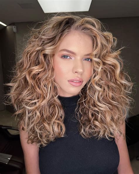 Light Brown Curly Hair: A Guide to 2023's Most Enchanting Locks