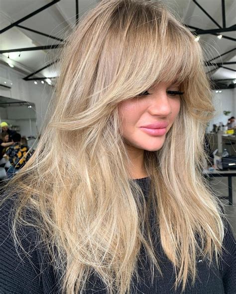 Long Layers with Bangs: