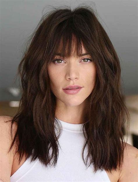 Long Wigs with Bangs: Wavy Brown Human Hair Wigs Face-Framing Long Wigs VS. 2025 Trends